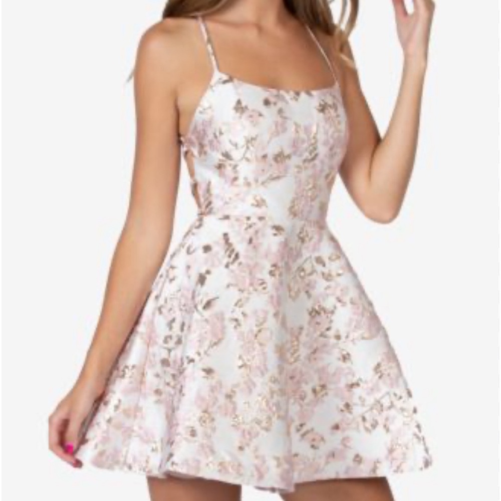 Sleeveless lace-up dress with shimmery metallic detail and embroidery